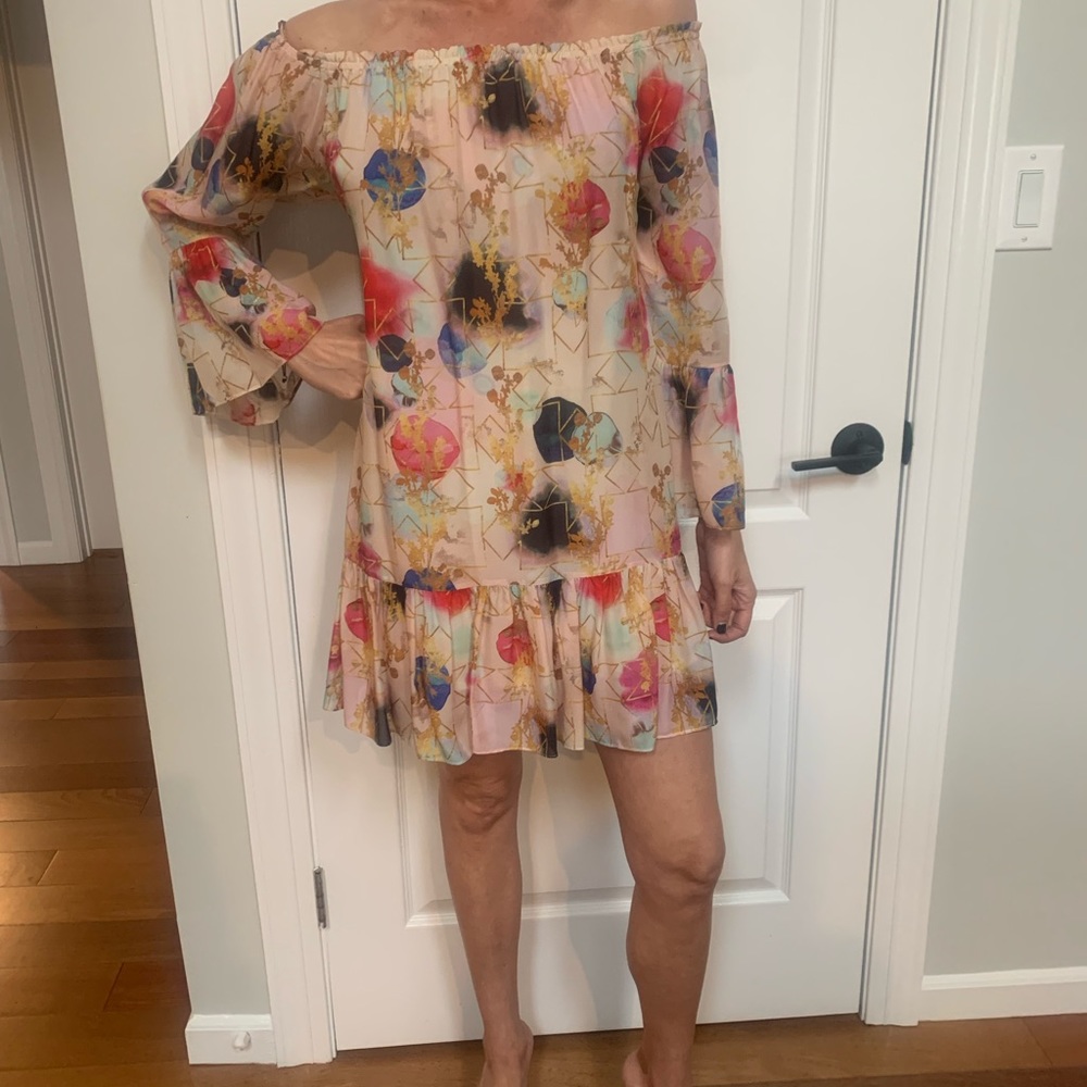 Beautiful off the shoulder multi color dress. Perfect for daycassion!